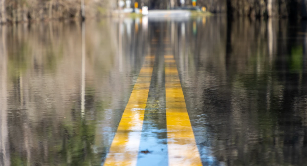 flooded main road with visible double yellow lines